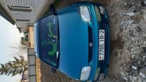 ������������� Mazda 323