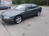 ������������� Mazda Xedos 9