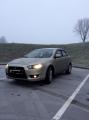 ������������� Mitsubishi Lancer